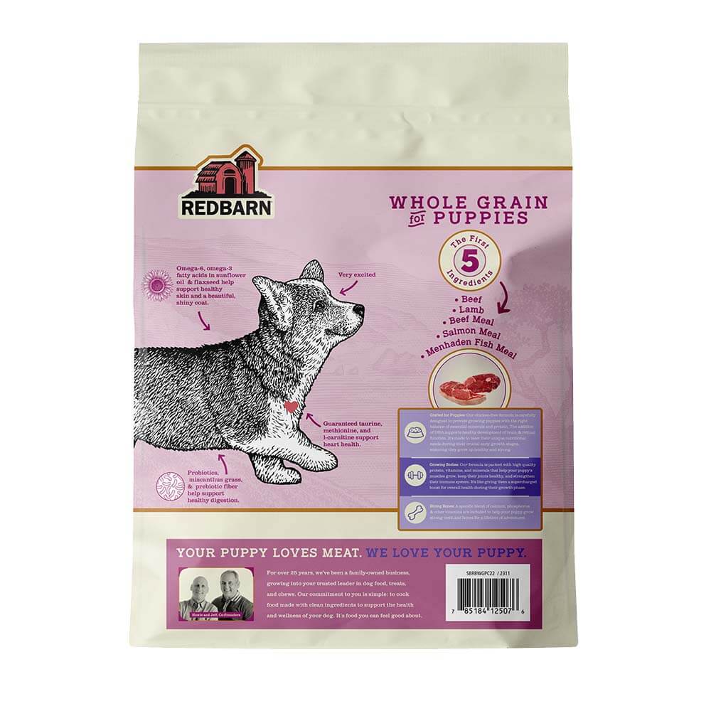 Bag of Redbarn Whole Grain Puppy Recipe Dog Food with a drawing of a corgi puppy