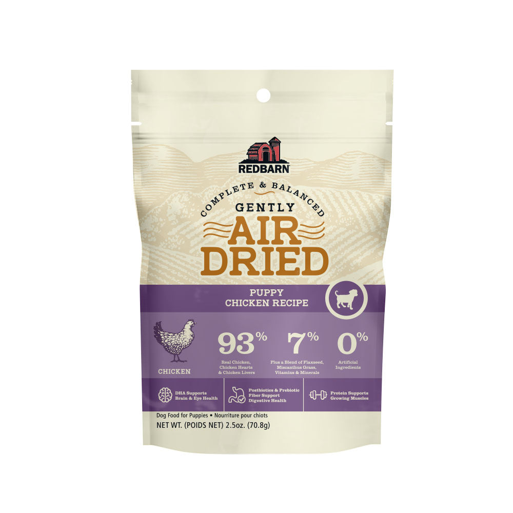 Tan and purple bag stating Air Dried Dog Food for Puppies - Chicken Recipe. 2.5 ounces.