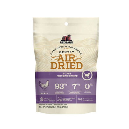 Tan and purple bag stating Air Dried Dog Food for Puppies - Chicken Recipe. 2.5 ounces.